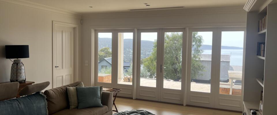 White painted timber French Doors including Fixed Internal sidelites